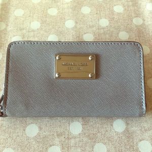 Michael Kors light gray smartphone wristlet